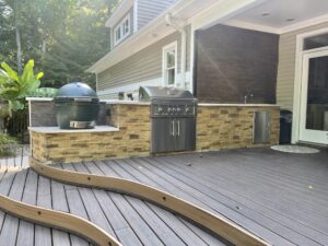 Custom outdoor kitchen installation by Marlowe's We Care Company